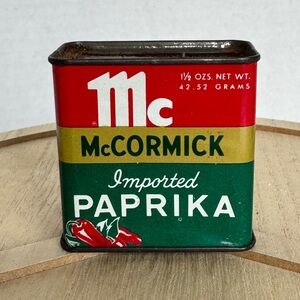 Vintage McCormick Tin Imported Paprika; slight rusting. Bend near bottom of tin.